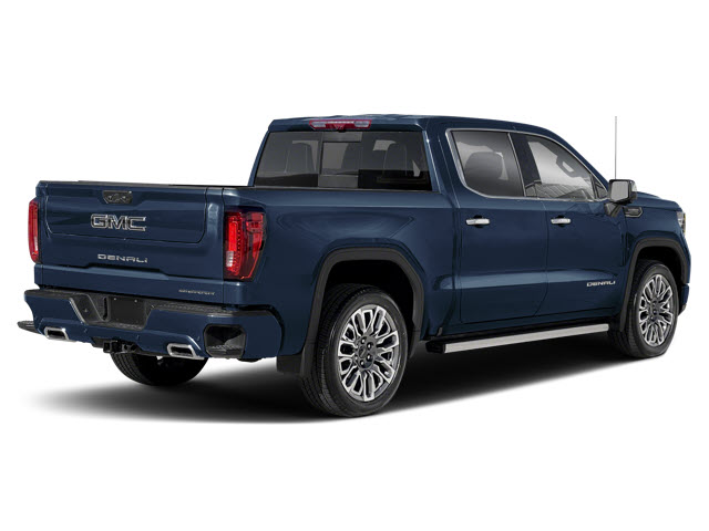 A dark blue 2026 GMC Sierra 1500 Denali truck viewed from the rear left side, showcasing its sleek design and chrome details.