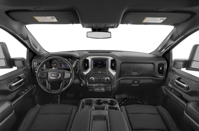 Interior view of a 2026 GMC Sierra 2500HD truck cabin featuring black upholstery, dashboard, and controls.